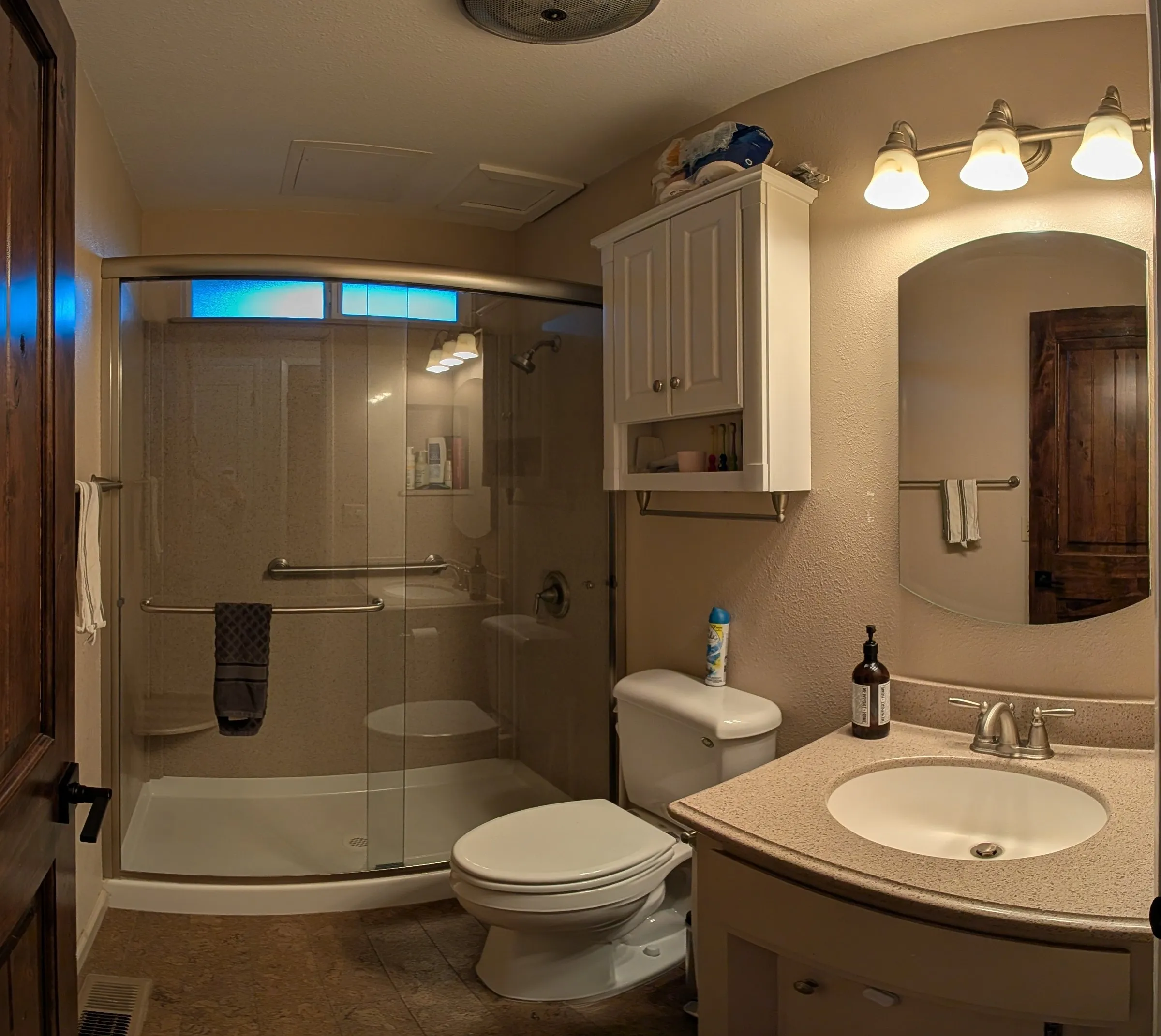 Main-floor full bathroom with walk-in shower