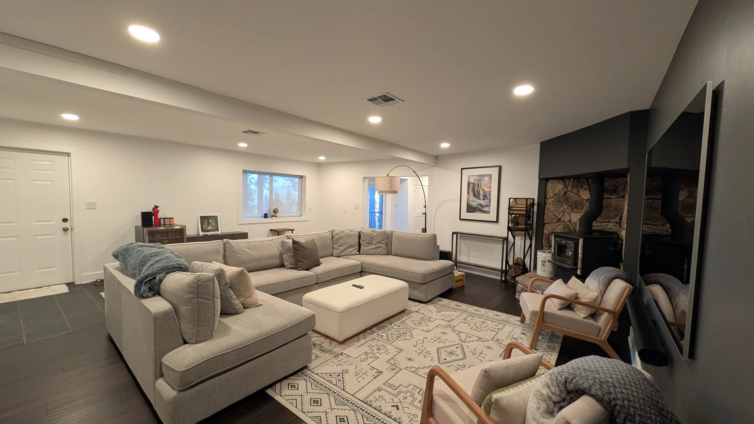 Movie room’s oversized sectional and ottoman